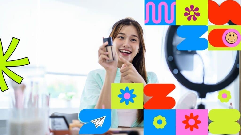 A smiling woman presenting a foundation bottle in front of a ring light, framed by colorful geometric patterns and doodles.